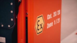 Label indicating explosion protection classes on a Linde R14 EX explosion-proof reach truck.