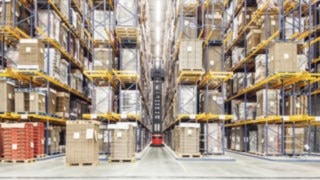 A Linde very narrow aisle truck in a high rack warehouse.