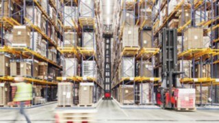 Narrow aisle truck in action in a warehouse