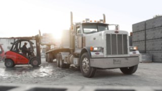 ic-truck loading another truck