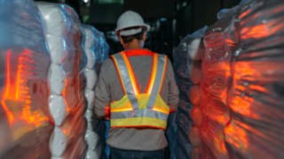 Interactive warning vest from Linde Material Handling glows in dark aisles