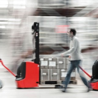 Pallet stacker from Linde Material Handling loaded with goods Pallet stacker from Linde Material Handling loaded with goods