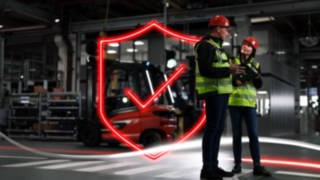 Linde Material Handling safety experts working at a customer’s premises. Linde Material Handling safety experts working at a customer’s premises.