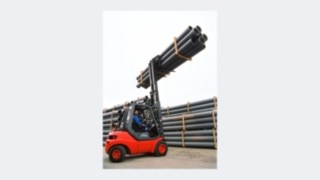 Forklift from the 351 product line lifting pipes