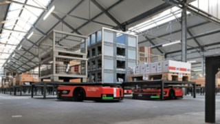 Two C-MATIC automated mobile platforms from Linde MH in the warehouse at ABS Safety.
