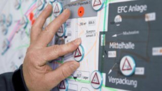 A CTL employee marks the high-risk areas detected by the Linde Safety Scan.