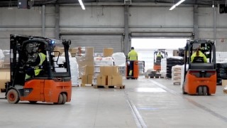 Various Linde MH forklift trucks transport goods in the warehouse at DB Schenker. Various Linde MH forklift trucks transport goods in the warehouse at DB Schenker.