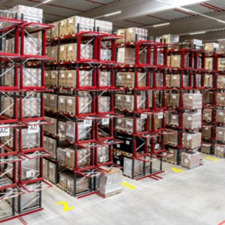 A row of high-rise racks in a warehouse.