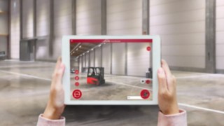 The Virtual Showroom app from Linde Material Handling projects an E16 into the surrounding warehouse on the tablet screen.