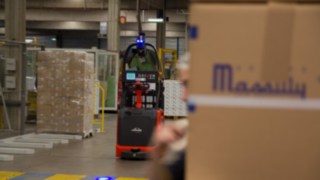Linde's L-MATIC pallet stacker on its way to the next station in Massily's warehouse. L-MATIC pallet stacker from Linde