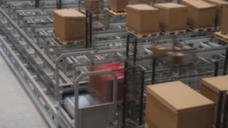 View of the electric floor conveyor and transported goods