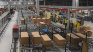 View of the electric floor conveyor and packing stations