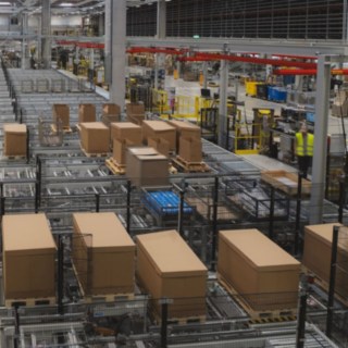 View of the electric floor conveyor and packing stations