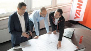 Experts from Linde Material Handling join forces to plan the Yanmar Compact Equipment Europe logistics center.