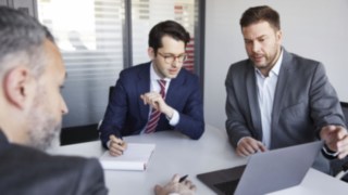 Linde Material Handling employees in a meeting