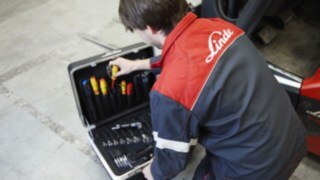 Service technician from Linde Service technician with his toolbox